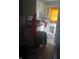 Image shows an outdated kitchen in need of repair with laminate flooring at 335 S Dearborn St, Indianapolis, IN 46201