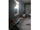 Interior shows a broken window and damaged flooring at 335 S Dearborn St, Indianapolis, IN 46201