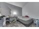 Bedroom featuring gray walls, a patterned carpet, and a queen-sized bed at 3655 Yellow Poplar Ct, Indianapolis, IN 46222