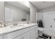 Bathroom featuring double sinks, modern fixtures, and a shower-tub combo at 3719 Lexham Ct, Danville, IN 46122