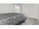 Simple bedroom with a bed and neutral colors at 3719 Lexham Ct, Danville, IN 46122