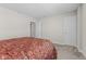 Bedroom featuring a bed with a red paisley comforter at 3719 Lexham Ct, Danville, IN 46122