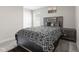 Stylish bedroom with a modern black and white patterned comforter set at 3719 Lexham Ct, Danville, IN 46122