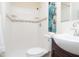Updated bathroom featuring a walk-in shower and modern tiling, providing a clean and stylish space at 3813 N Hartman Dr, Indianapolis, IN 46226