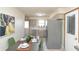 Eat-in Kitchen with stainless steel appliances and table with chairs at 3813 N Hartman Dr, Indianapolis, IN 46226