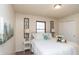 Serene bedroom with soft lighting, plush bedding, and decorative wall art at 3813 N Hartman Dr, Indianapolis, IN 46226