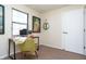 Bright office space with eclectic artwork and a modern chair and desk at 3813 N Hartman Dr, Indianapolis, IN 46226