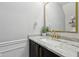 Bathroom with marble countertop and golden faucet at 3832 Kilburn Ct, Indianapolis, IN 46228