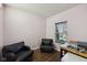 Small room with two chairs, a window and a table at 3832 Kilburn Ct, Indianapolis, IN 46228