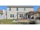 Home exterior features a deck, patio and wood pergola strung with lights at 3832 Kilburn Ct, Indianapolis, IN 46228