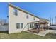 Home exterior features a deck, patio and wood pergola strung with lights at 3832 Kilburn Ct, Indianapolis, IN 46228
