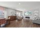 Spacious living room with an adjacent dining area, perfect for entertaining guests at 3832 Kilburn Ct, Indianapolis, IN 46228
