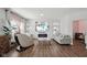Stylish living room with a modern fireplace, recessed lighting, and comfortable seating at 3832 Kilburn Ct, Indianapolis, IN 46228