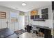 Inviting home office with a spacious desk, natural light, and modern decor at 3832 Kilburn Ct, Indianapolis, IN 46228