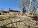 Back exterior view of a brick house with a pier, dock and grassy area at 5850 Paradise Ln, Martinsville, IN 46151