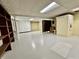 Spacious basement area with white painted floor, utility closet, and open space at 5850 Paradise Ln, Martinsville, IN 46151