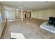 Large basement featuring ceramic tile floor, fireplace, support pillars, and natural light at 5850 Paradise Ln, Martinsville, IN 46151