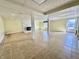 A spacious basement features a tile floor, painted columns, and a fireplace, providing a versatile living area at 5850 Paradise Ln, Martinsville, IN 46151