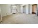 Bedroom with neutral walls, carpet, closet, and a window at 5850 Paradise Ln, Martinsville, IN 46151
