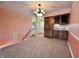 View of the dining area with stairway and views into the kitchen and living room at 5850 Paradise Ln, Martinsville, IN 46151