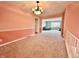 Charming dining room with access to the living room and staircase with views of the yard at 5850 Paradise Ln, Martinsville, IN 46151