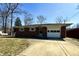 Exterior of a one-story brick house with attached garage and a curved driveway at 5850 Paradise Ln, Martinsville, IN 46151