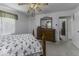 Carpeted bedroom features a large dresser with a mirror and ample storage at 6204 S Madison Ave, Indianapolis, IN 46227