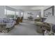 Spacious living room with comfortable furniture, ample natural light, and neutral tones at 6204 S Madison Ave, Indianapolis, IN 46227