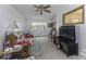 Bright living room features comfortable seating, a large window, and a relaxed atmosphere at 6204 S Madison Ave, Indianapolis, IN 46227