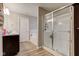 Bathroom featuring a glass-enclosed shower, vanity, and a large soaking tub at 6615 Aberdeen Dr, McCordsville, IN 46055