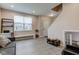 Cozy living room with wood floors, staircase, neutral paint, and large window at 6615 Aberdeen Dr, McCordsville, IN 46055