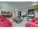 Open living space with eat-in kitchen, living room with fireplace and tv, and a comfortable seating area at 6615 Aberdeen Dr, McCordsville, IN 46055
