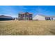 Expansive backyard with a well-maintained lawn, offering ample space for outdoor activities and relaxation at 6699 Dunkirk Dr, McCordsville, IN 46055