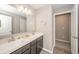 Bathroom features a double vanity and a large mirror at 6699 Dunkirk Dr, McCordsville, IN 46055