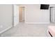 Bedroom features neutral walls and carpet with a mounted TV at 6699 Dunkirk Dr, McCordsville, IN 46055