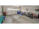 Spacious garage with overhead door, providing ample storage and parking at 6699 Dunkirk Dr, McCordsville, IN 46055