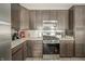 Close up of a kitchen with stainless steel appliances and ample countertop space at 6699 Dunkirk Dr, McCordsville, IN 46055