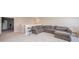 Cozy upstairs living room with plush seating and neutral carpeting at 6699 Dunkirk Dr, McCordsville, IN 46055