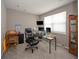 A functional office space with a desk, multiple monitors, and a comfortable chair at 6699 Dunkirk Dr, McCordsville, IN 46055