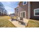 Cozy patio with a grill and comfortable seating, perfect for outdoor entertaining and relaxation at 6699 Dunkirk Dr, McCordsville, IN 46055