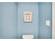Bathroom featuring soft blue walls and a framed bathroom procedure sign at 6895 Honeysuckle Way, Pendleton, IN 46064
