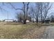 Spacious backyard featuring mature trees and great space to enjoy at 7089 W Us Highway 36, Danville, IN 46122