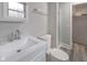 Updated bathroom featuring a modern vanity and fixtures, as well as a shower at 7089 W Us Highway 36, Danville, IN 46122