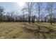 Large yard with sunshine and mature trees at 7089 W Us Highway 36, Danville, IN 46122