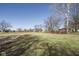 Expansive yard with mature trees, offering a large and private outdoor space at 7089 W Us Highway 36, Danville, IN 46122