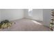 Minimalist bedroom with carpet and a window, offering a cozy, unfinished space at 737 Oxford Ln, Danville, IN 46122