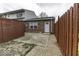 Fenced backyard featuring a patio and a small grassy area at 741 Southfield Ct, Indianapolis, IN 46227