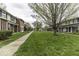 Scenic view of the lawn-covered, tree-lined community at 741 Southfield Ct, Indianapolis, IN 46227