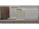 Selection of interior finishes including flooring, cabinet, counter and tile samples with a cool, modern aesthetic at 8445 Morgan Ln, Zionsville, IN 46077