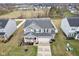 Aerial shot of a home showcasing its well-maintained landscaping, and spacious driveway at 856 Parker Ln, Westfield, IN 46074